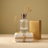 Flacon de parfum en verre transparent de luxe, nouveau design, 100 ml, avec vaporisateur anti-fuite et boîte d'emballage personnalisée