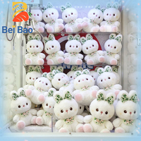 Jouets en peluche lapin rembourrés en gros de 8 pouces pour machine à griffes, poupées lapin moelleuses personnalisables avec logo