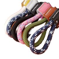 Nouvel arrivage Porte-clés de luxe pour chiot Pendentif lanière anti-perte avec corde tissée Porte-clés voiture de combat pour chien en cuir de qualité supérieure