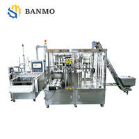 Ligne de remplissage et de bouchage automatique à 4 têtes pour sachets à bec verseur avec système de nettoyage des becs, système d'emballage rotatif haute vitesse pour boissons et vin