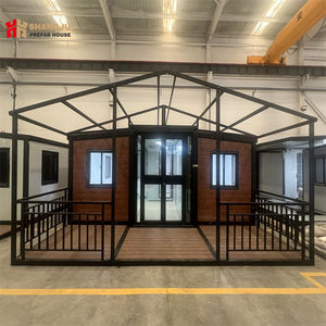 Maison en conteneur préfabriquée moderne américaine à bas prix 20ft/40ft <span class=keywords><strong>10m2</strong></span> 2 chambres à coucher <span class=keywords><strong>bureau</strong></span> modulaire en acier léger maison en paquet plat - Product Image 1