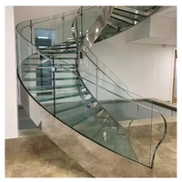 Escaliers en colimaçon métalliques d'intérieur design moderne verre trempé incurvé de haute qualité pour villas appartements cuisines directement de l'usine