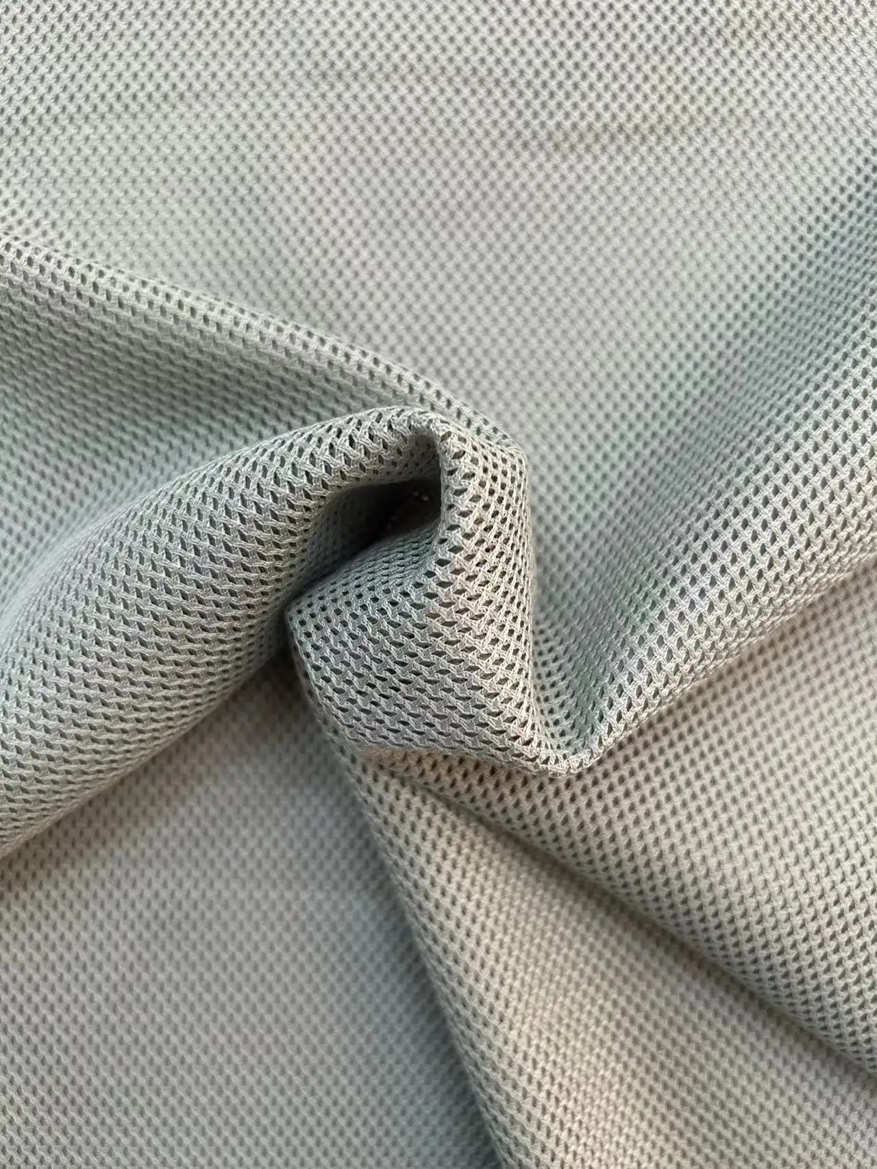 Siyuanda Chất Liệu Mới Polyester Vải Thoáng Khí Thể Thao Lưới Dệt Kim Vải Cho Quần Áo