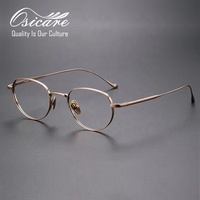 Gafas de titanio puro de diseño minimalista, montura óptica dorada, lentes de metal al por mayor, gafas para hombre pequeñas IP