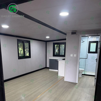 Maison conteneur préfabriquée de luxe de 20 pieds avec terrasse et toit Maison modulaire extensible moderne Résidence meublée portable