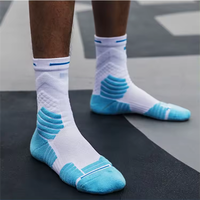 Blanc Noir et Orange Printemps Chaussettes de sport de basket-ball à la mode Hommes Chaussettes personnalisées de qualité supérieure