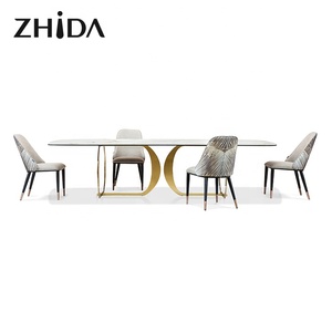 <span class=keywords><strong>Table</strong></span> à <span class=keywords><strong>manger</strong></span> de luxe pour villa, 6 à 8 places, base en acier inoxydable doré, plateau en marbre, vente en gros par l'usine de meubles Foshan - Product Image 1