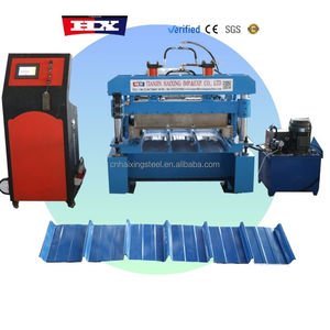 Feuille <span class=keywords><strong>de</strong></span> <span class=keywords><strong>toiture</strong></span> IBR faisant le petit pain formant la machine Rollformer <span class=keywords><strong>de</strong></span> tuile <span class=keywords><strong>de</strong></span> toit en <span class=keywords><strong>acier</strong></span> feuille <span class=keywords><strong>de</strong></span> toit à haute nervure formant des machines - Product Image 1