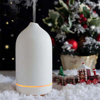 Vente en gros d'humidificateur ultrasonique de parfum de luxe noir avec logo personnalisé pour la maison machine électrique à air diffuseur d'arôme en céramique d'huiles essentielles