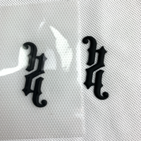 Logo de marque personnalisé en relief 3D, étiquette de vêtement en silicone caoutchouc 3D, autocollant thermocollant pour T-shirt