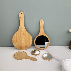 Peignes à <span class=keywords><strong>cheveux</strong></span> en bois avec logo personnalisé populaire brosses pour <span class=keywords><strong>brosse</strong></span> de massage de <span class=keywords><strong>cheveux</strong></span> <span class=keywords><strong>magique</strong></span> + miroir de maquillage à <span class=keywords><strong>la</strong></span> main en bois de bambou - Product Image 1