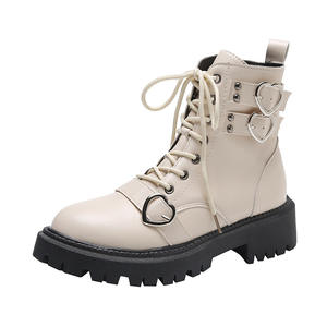 Mode croix-sangle couleur unie <span class=keywords><strong>bottes</strong></span> à lacets 2023 femmes Design amour bouton semelle épaisse Doc <span class=keywords><strong>bottes</strong></span> western cowboy <span class=keywords><strong>bottes</strong></span> - Product Image 6