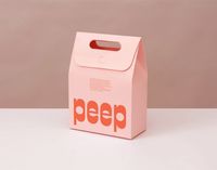 Boîte en papier kraft brun écologique pour fruits, cadeaux ou produits de boulangerie, avec impression numérique et poignée pliable.