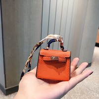 Porte-clés en cuir mini inspiré de H, multifonctionnel, avec rangement pour écouteurs et porte-monnaie, accompagné d'un foulard en soie, accessoire de mode