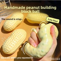 Balle de construction en caoutchouc en forme d'arachide, jouet anti-stress à presser et pincer, à rebond lent, avec son crépitant et sensation tactile