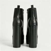 Bottines Chelsea noires en similicuir pour femme, à plateforme, avec fermeture éclair latérale élastique, bout rond, talon bloc épais et tirette.