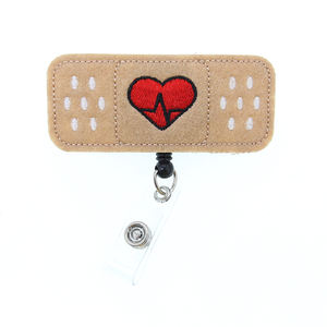 تصميم مخصص كارتون ضمادة ابتسامة مع قوس قابل للسحب ملحقات ممرضة طبية حامل شارة لحفلات الزفاف - Product Image 4