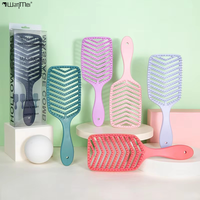 Brosse à cheveux évidée pratique pour démêler et masser, idéale pour coiffure sur cheveux secs ou mouillés