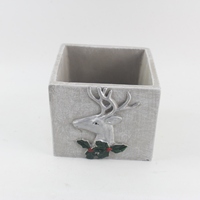 Nouveau pot en ciment gris écologique avec décorations de Noël pour plantes d'intérieur, présentation et rangement de fleurs sur le sol