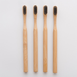 Cepillo de dientes redondo de carbón con mango para adultos, cerdas suaves, venta al por mayor directa de fábrica, artículos de tocador para hoteles y hostales - Product Image 3