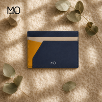 Porte-cartes en cuir bleu marine, étui minimaliste pour cartes avec panneaux color block, poche géométrique et fentes horizontales, offre OEM