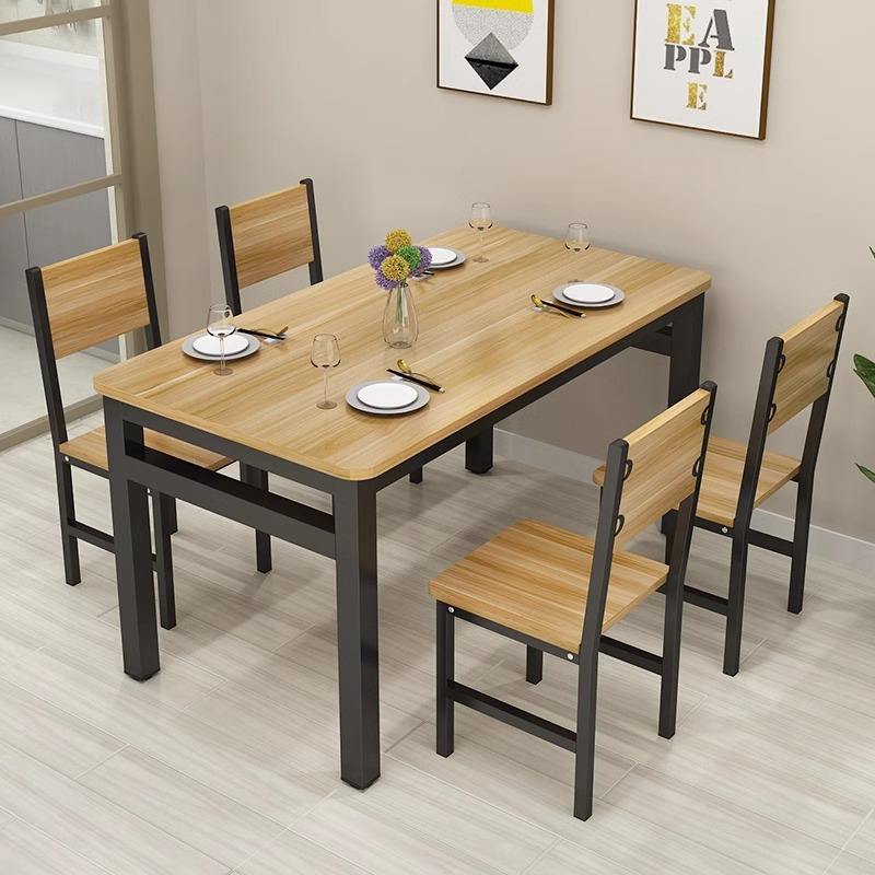 Oak-colored black frame table and four chairs