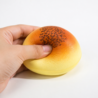 Jouet Squishy en forme de pain rond à remontée lente, garniture au sésame noir, anti-stress, compagnon de bureau