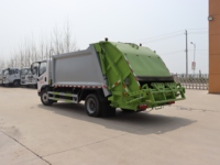 Camion compacteur de déchets à chargement arrière manuel FAW Jiefanghu VH 4x2 - 8-12 mètres cubes pour une collecte efficace des déchets municipaux