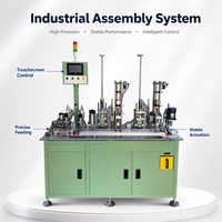 Machine d'assemblage de roulements à billes avec système de remplissage de graisse, de pressage de joints et de pressage de couvercles anti-poussière