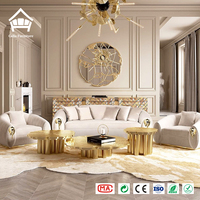 Ensemble de tables basses sculpturales haut de gamme en laiton poli doré, design anneau d'arbre organique, mobilier complet pour villa et hôtel