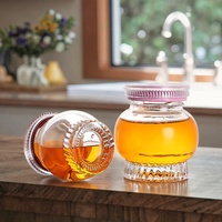 Pot de miel en verre en stock Cadeau de mariage de haute qualité Pot de confiture en verre créatif avec couvercle Récipient hermétique