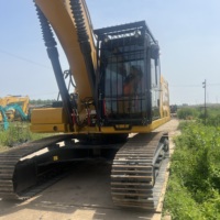 Excavatrice sur chenilles Caterpillar CAT330GC d'occasion, 30 tonnes, pour travaux miniers, de terrassement et de construction