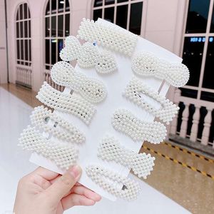 Pinzas para el pelo con perlas, diseño mixto, de plástico, para uso diario, verano 2022, origen Yiwu - Product Image 1