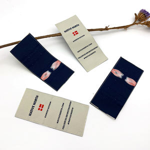 Etiquetas bonitas con dobladillo tejido al por mayor, fabricación personalizada de su propio logotipo, etiqueta con dobladillo tejido para ropa y prendas de vestir - Product Image 1