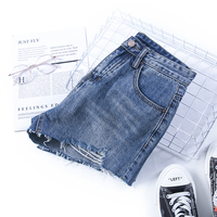 Short en jean vintage délavé personnalisé pour femme, taille haute, design déchiré et vieilli, bords irréguliers effilochés