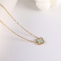 Chaîne de clavicule en or 18 carats, trèfle à quatre feuilles double face en nacre, best-seller transfrontalier, tendance pour femme