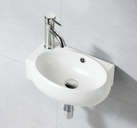 Lavabo mural en céramique de forme ovale miniature, sanitaire, lavabo de comptoir, lavabo artistique, meubles de salle de bain, lavabos pour hôtel