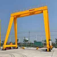 Grue à portique mobile robuste pour les opérations de conteneurs avec une capacité de levage de 20 à 40 tonnes, entraînement par moteur et moteur