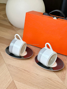 Hot Sale European Luxury <b>black</b> and white Circle Porcelain Tea Cup & Saucer Set With exquisite <b>gift</b> <b>box</b> for friend - Product Image 2