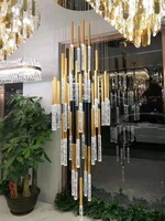 Lustre moderne contemporain en cristal doré en spirale suspendu à LED pour long escalier de villa