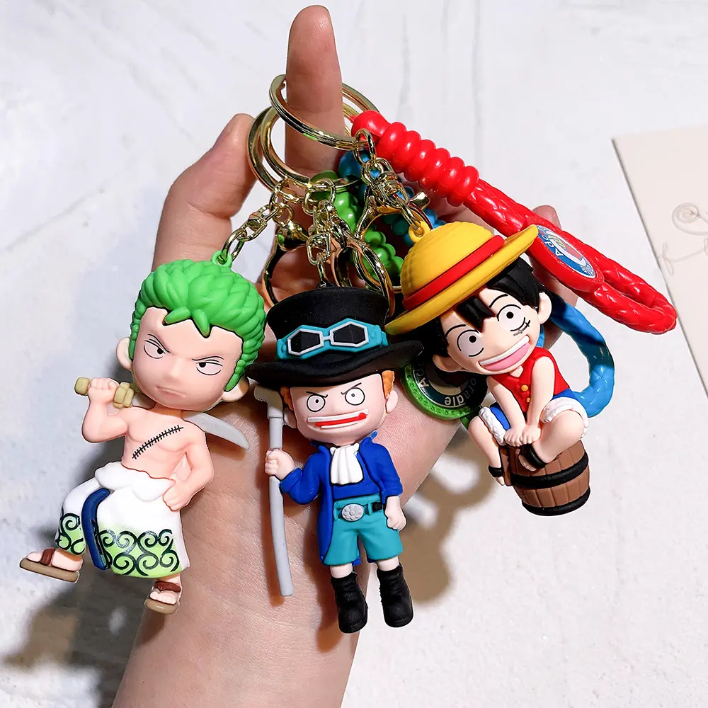 Venta al por mayor 3D Japón Anime un personaje pieza llavero goma dibujos animados colgante regalo Luffy llaveros Pvc llaveros