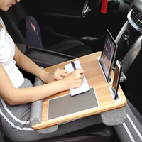 Table de lit multifonctionnelle pour ordinateur portable avec surface en bois et base rembourrée, idéale pour travailler et lire sur le canapé