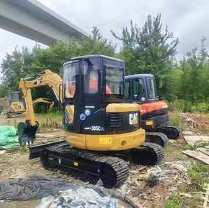 Mini-excavatrice Caterpillar 305.5CCR d'occasion certifiée EMC CE, 5,5t, compacte, hydraulique, moteur Cummins, avec accessoire tarière - Product Image 2