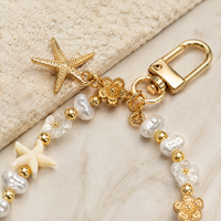 Porte-clés étoile de mer en alliage de zinc fait main avec perle, breloque de sac, pendentif, accessoire de sac à main, ornement suspendu, cadeau pour femme, prêt à expédier