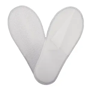 Nuevo producto Zapatilla de hotel Zapatillas de SPA con punta cerrada baratas integradas para tela no tejida de un solo uso