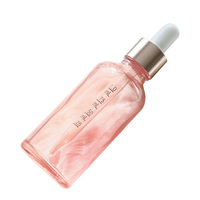 Flacon compte-gouttes rose vide et transparent de 20ml pour huile de pilosité faciale de conception personnalisée d'essence de verre d'huile essentielle à pompe liquide