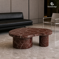 Table basse en pierre naturelle sur mesure avec tambours décalés pour projets hôteliers et villas