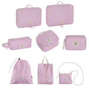 Ensemble de cubes de rangement de voyage en nylon rayé rose, pochette de rangement pour bagages, organisateur de voyage multifonctionnel pour les voyages d'affaires - Product Image 1