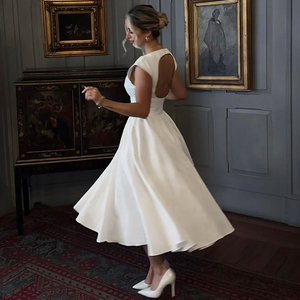 Robe midi élégante T-1545 pour femme, dos nu, taille haute, coupe trapèze, couleur unie, col rond, ourlet évasé, idéale pour l'été, le printemps, les invitées de mariage, les soirées ou les cocktails - Product Image 5