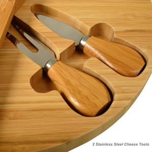 Tabla <span class=keywords><strong>de</strong></span> <span class=keywords><strong>queso</strong></span> <span class=keywords><strong>de</strong></span> bambú patentada/plato <span class=keywords><strong>de</strong></span> servicio <span class=keywords><strong>de</strong></span> charcutería calidad comprobada diseño <span class=keywords><strong>de</strong></span> <span class=keywords><strong>cuña</strong></span> compacta producto <span class=keywords><strong>de</strong></span> herramientas <span class=keywords><strong>de</strong></span> <span class=keywords><strong>queso</strong></span> <span class=keywords><strong>de</strong></span> 13 \ "<span class=keywords><strong>de</strong></span> diámetro - Product Image 3